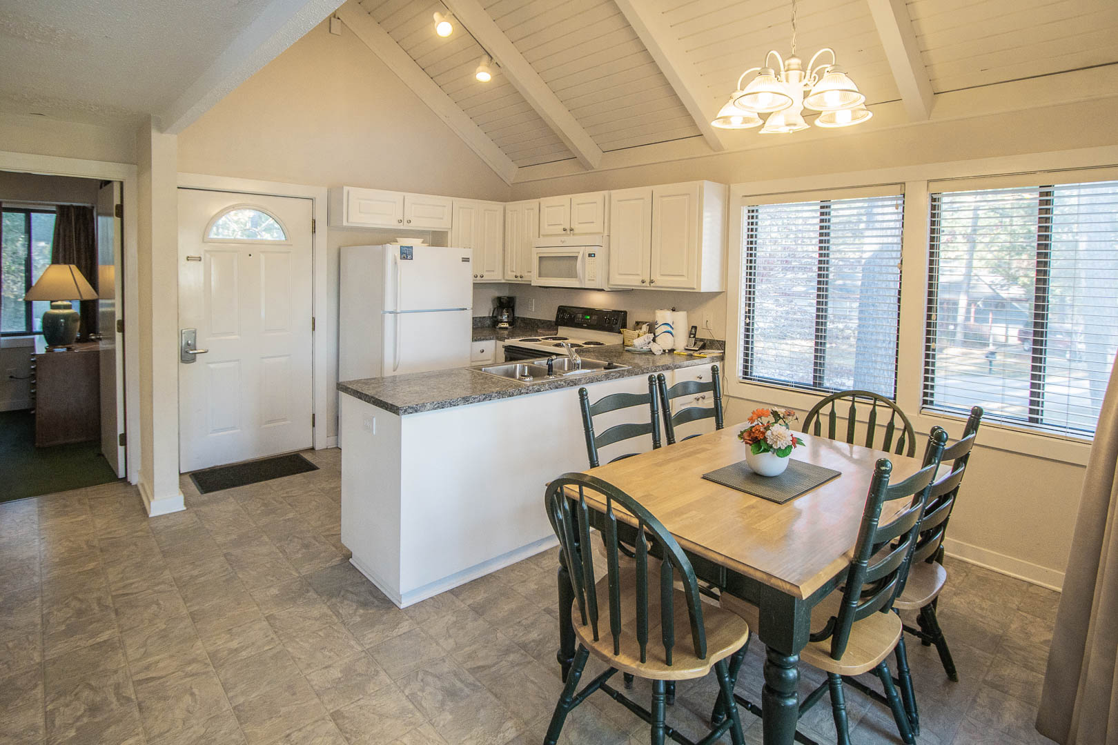 A spacious kitchen and dining room at VRI's Waterwood Townhomes in New Bern, North Carolina.